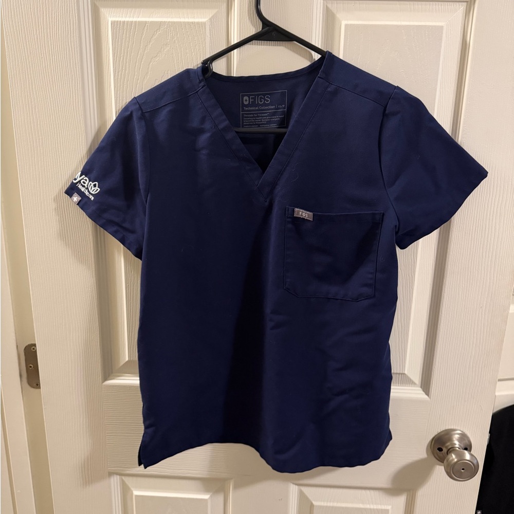 FIGS Women’s Navy V-Neck Medical Scrub Top with Aya Healthcare embroidery